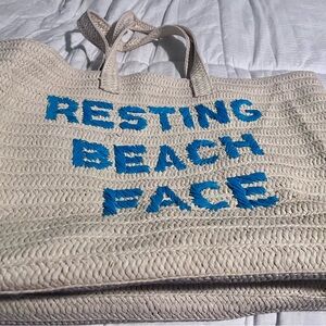 Resting Beach Face Straw Tote Bag
